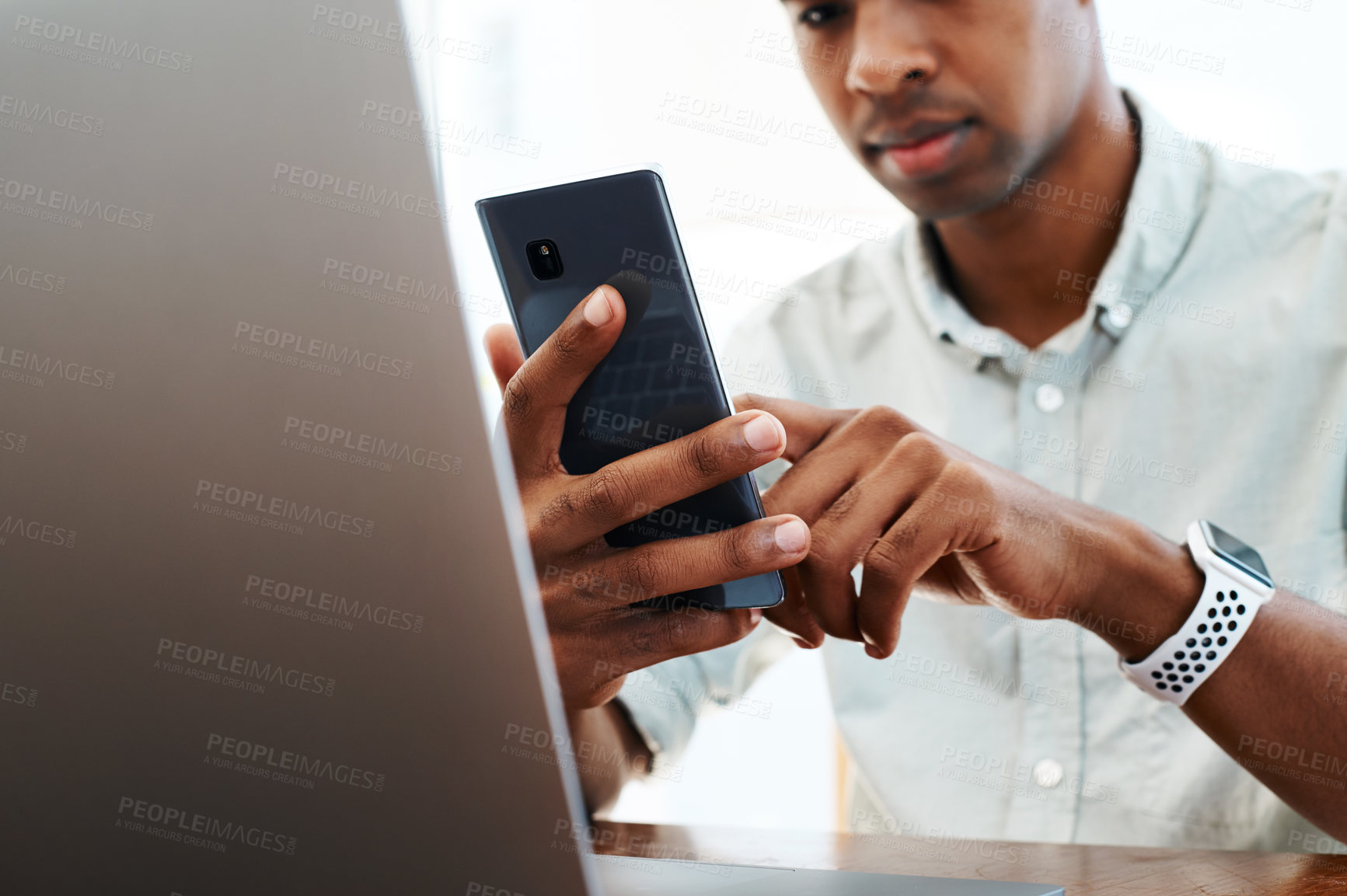 Buy stock photo Hands, phone and businessman in office, startup and reading with notification, chat or mobile app. Person, smartphone and writer with contact, schedule or reminder with networking at creative agency