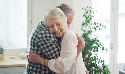 Buy stock photo Cropped shot of an affectionate couple spending time together at home