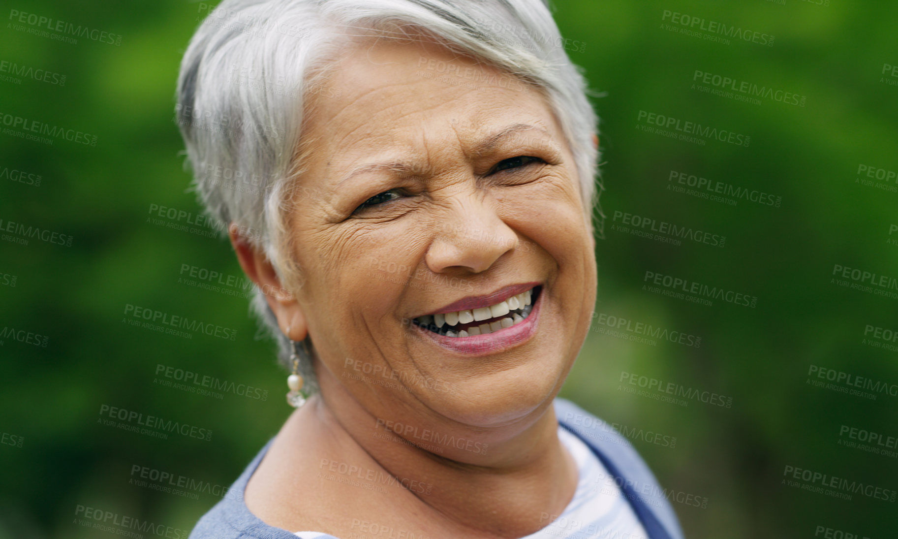 Buy stock photo Portrait of a confident senior woman enjoying a day in the park
