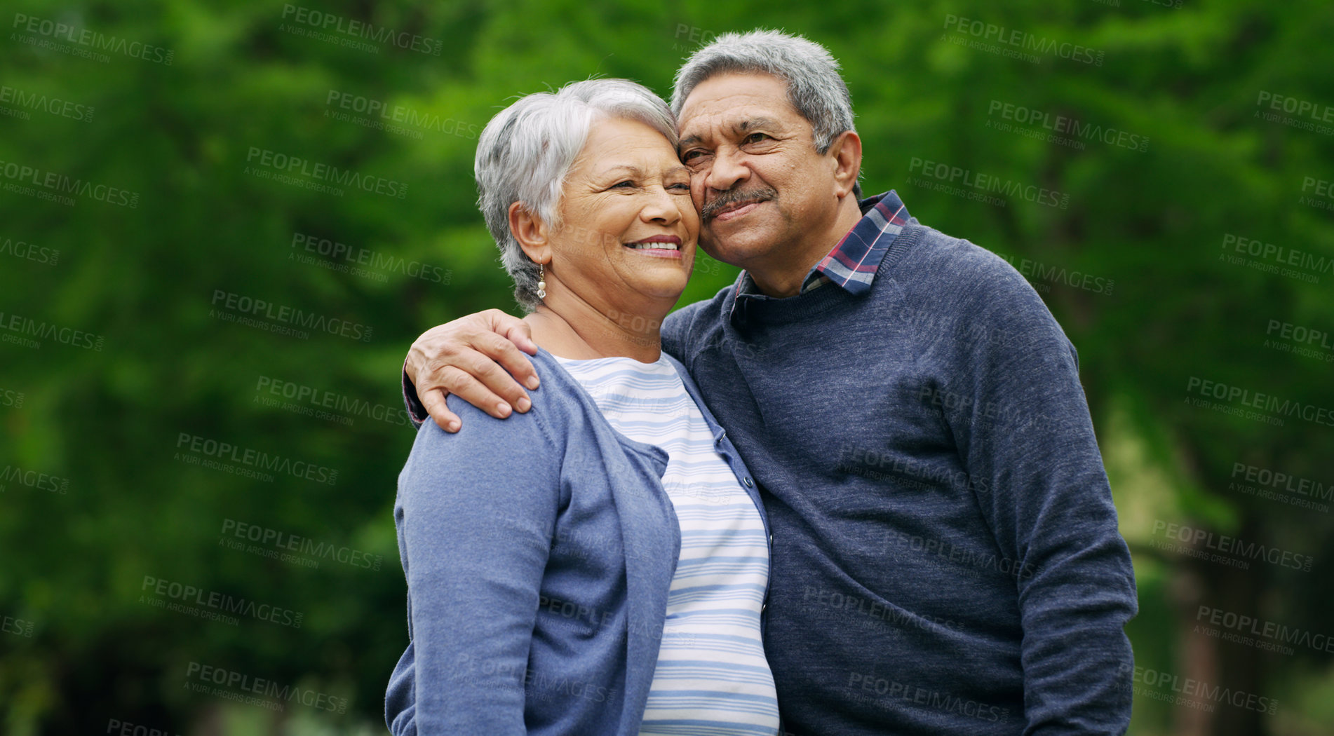 Buy stock photo Shot of a happy senior couple spending a romantic day in the park