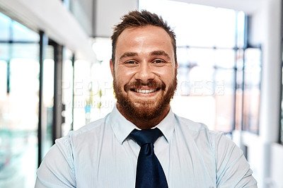 Buy stock photo Portrait of a young businessman standing in an office