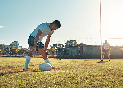 Buy stock photo Shot of a rugby player getting ready to score
