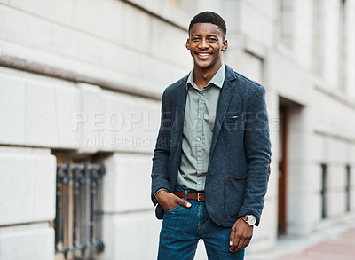 Buy stock photo Stylish, trendy and handsome businessman walking to work in the city alone. Portrait of a cool black male entrepreneur commuting to his job and looking happy, carefree and cheerful in the morning