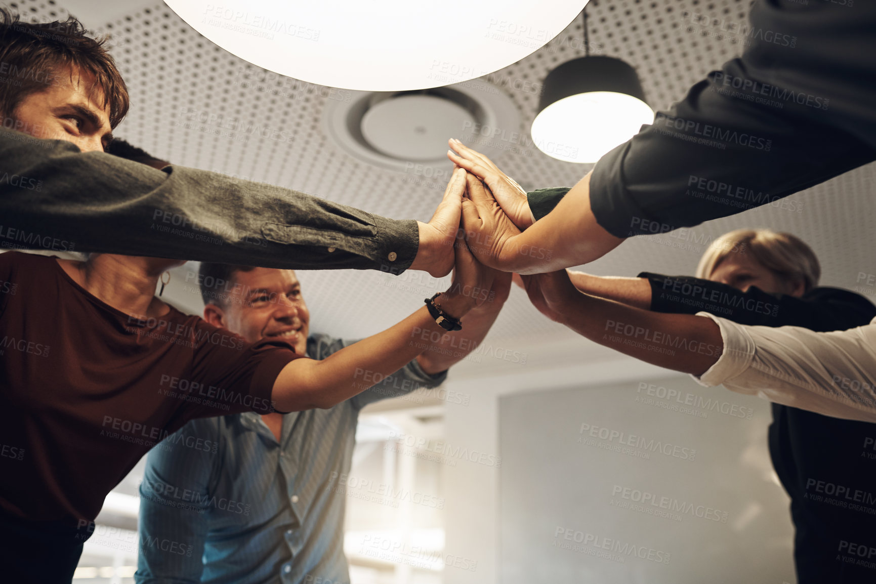 Buy stock photo Business people, meeting and high five with teamwork for motivation, unity or collaboration at office. Group, employees or colleagues with hands together in solidarity for mission, synergy or support