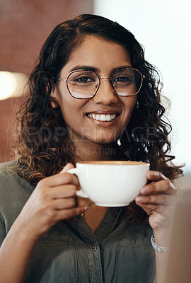 Buy stock photo Portrait of a young woman having coffee in a cafe