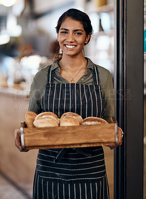 Buy stock photo Entrepreneur, portrait and happy in cafe for bread, service expert and startup development with apron. Woman, face and confidence in bakery for small business, pride and franchise ambition with food