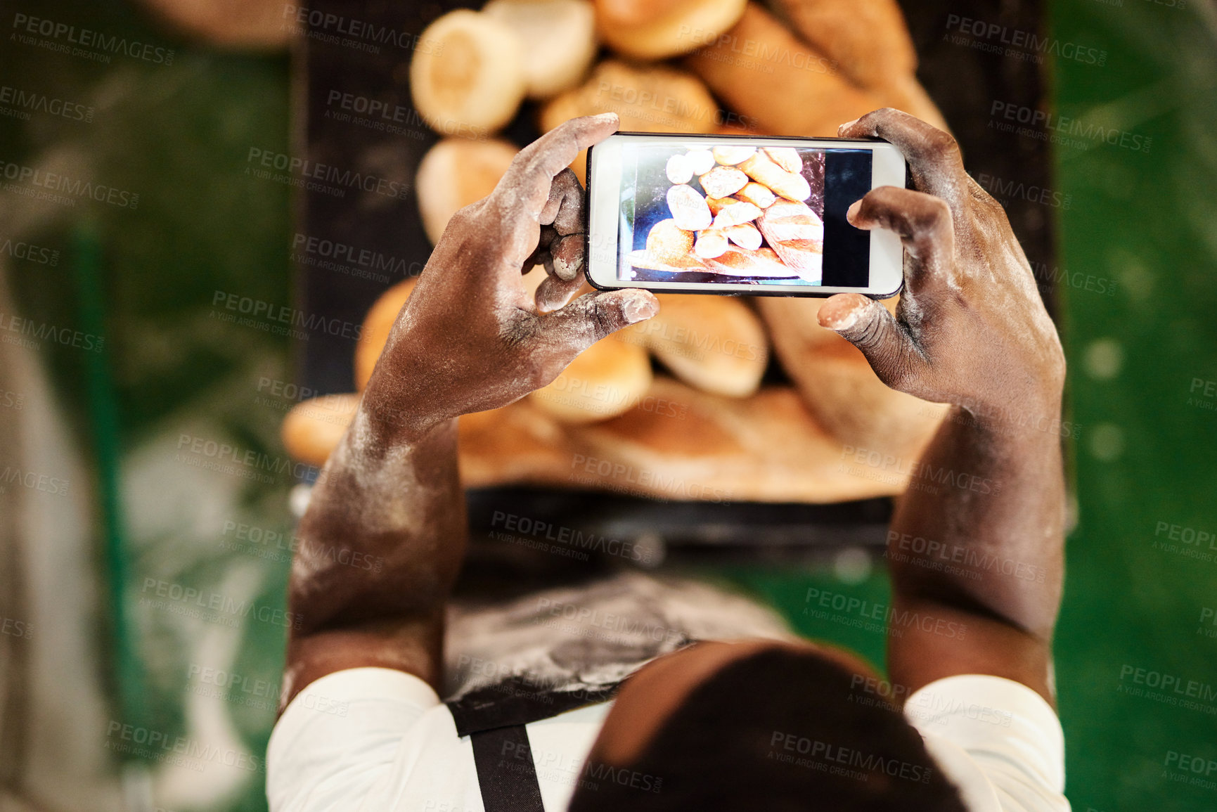 Buy stock photo Black man, bakery or above with phone screen for picture, photography or bread at store. Top view, male person or baker with mobile smartphone for content creation, rolls or collection at pastry shop