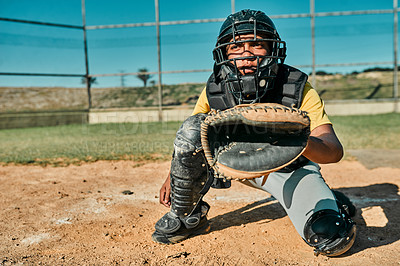 Buy stock photo Shot of the catcher sitting in position to catch the ball