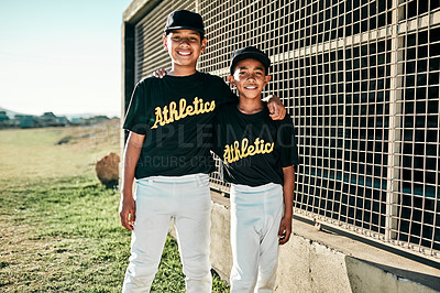 Buy stock photo Portrait of two young baseball players standing together on the pitch