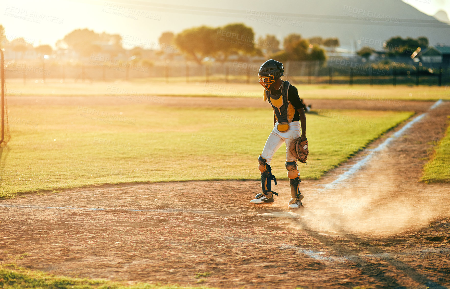 Buy stock photo Shot of a baseball player running during a match