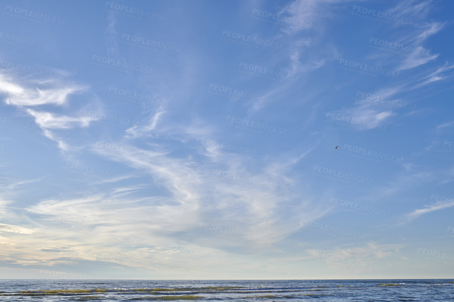 Buy stock photo Beach, waves or shoreline with vacation, location or weekend break for getaway trip. Ocean, clouds or tropical island for summer holiday, environment and empty with landscape and travel in Zanzibar