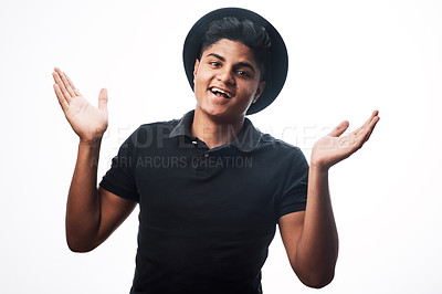 Buy stock photo Studio shot of a young man posing against a white background