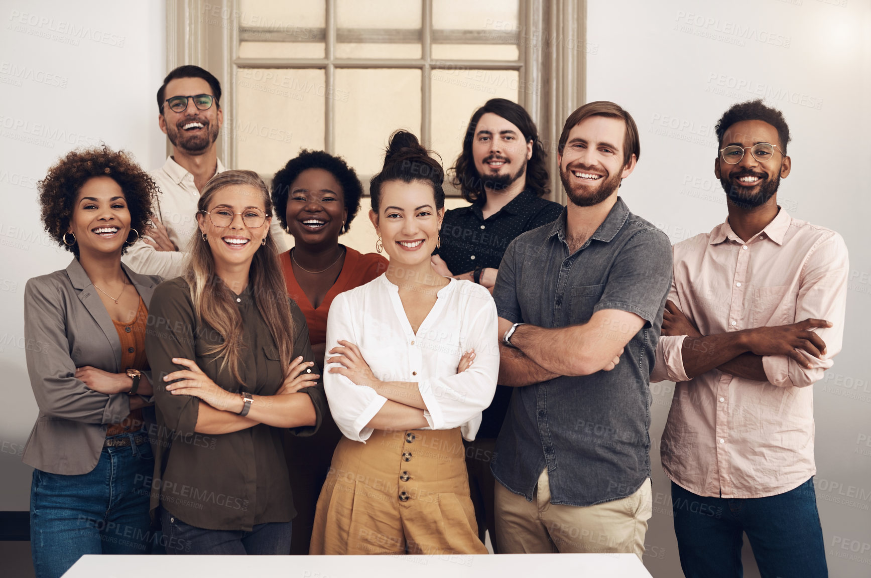 Buy stock photo Happy, diverse and smiling startup entrepreneurs standing together showing teamwork goals. Contact us and learn about us and our vision, mission and faq from our international business community