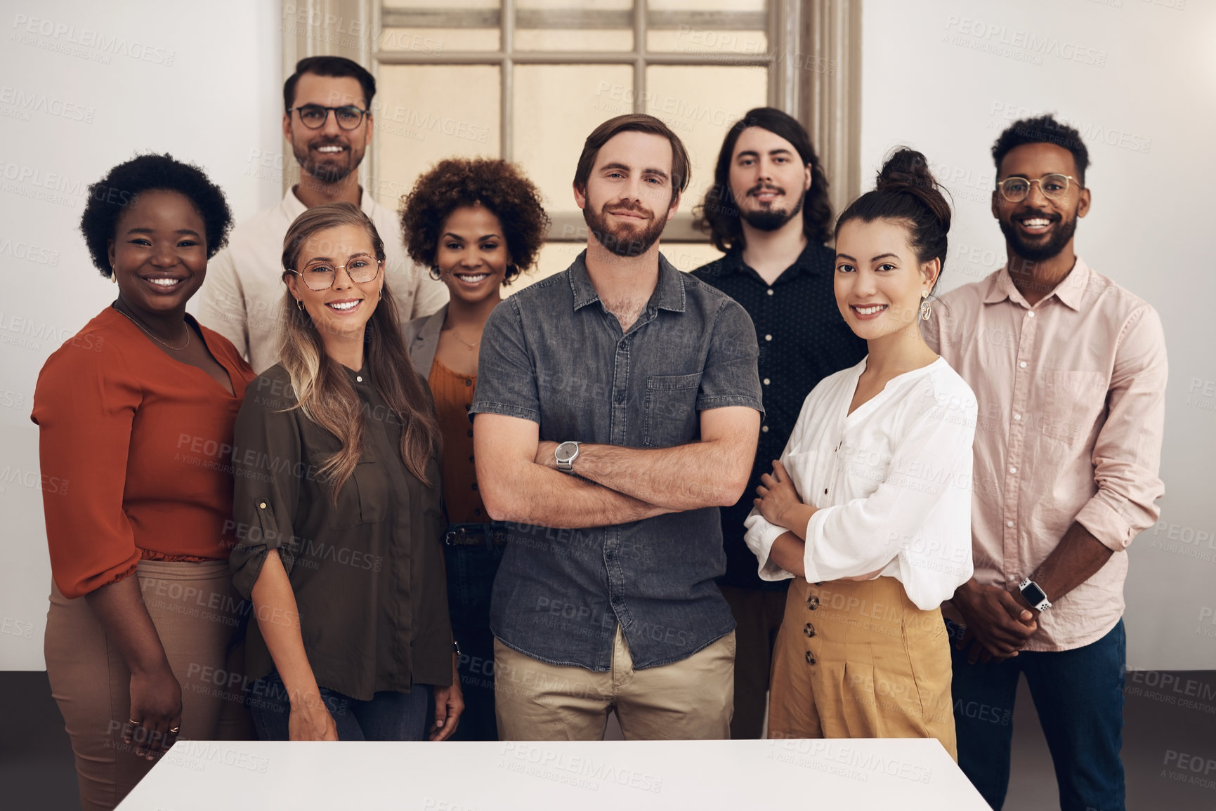 Buy stock photo Group portrait of confident, diverse and proud businesspeople standing together showing teamwork goals. Contact us and find out about us and our vision, mission and faq from our young community