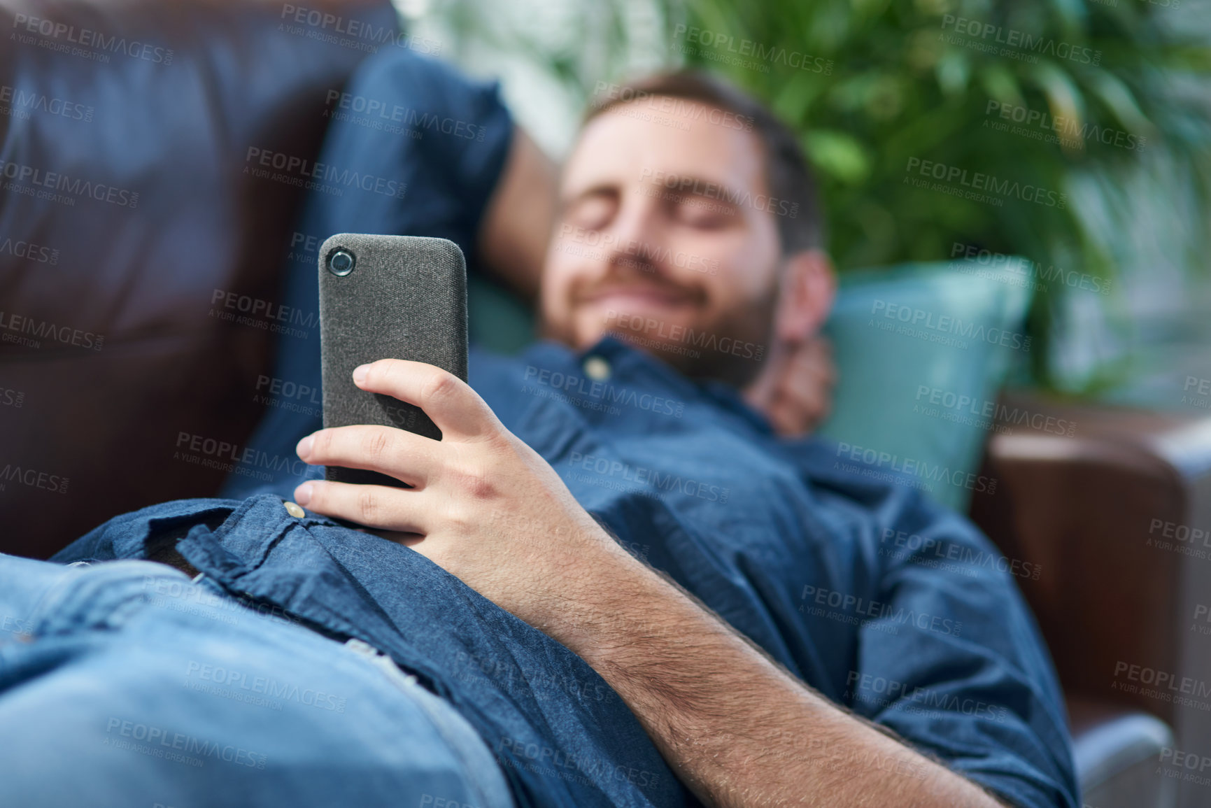 Buy stock photo Phone, relax and hand of man on sofa in home reading online blog with social media, website or internet. Communication, cellphone and person rest in living room for networking on mobile app at house.