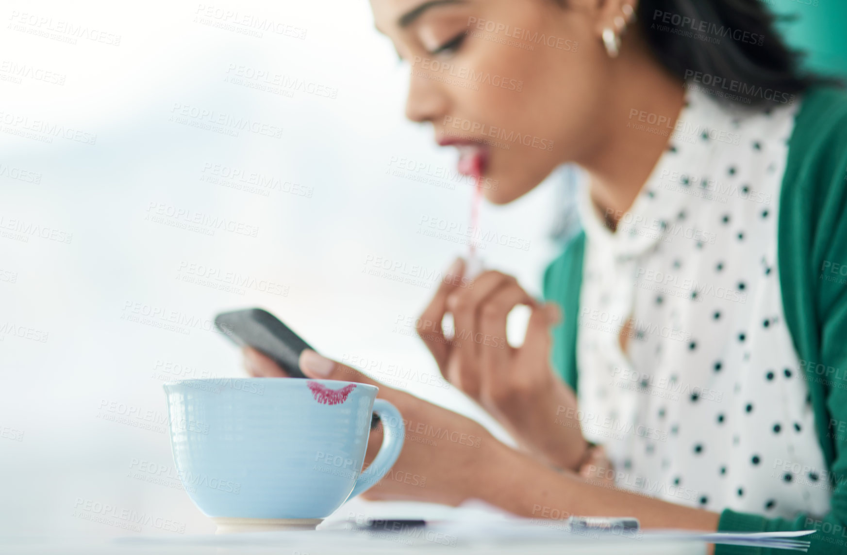 Buy stock photo Woman, lipstick and smartphone for beauty in office with smudge on cup, reflection and makeup in morning. Person, phone and cosmetics with color, application and lips at startup creative agency