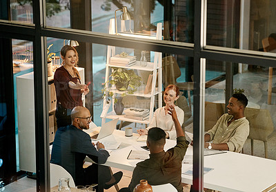 Buy stock photo Businesspeople in a marketing growth strategy discussion in a collaboration meeting using teamwork inside a modern office. Mindset development and team building by diverse, smart and creative adults
