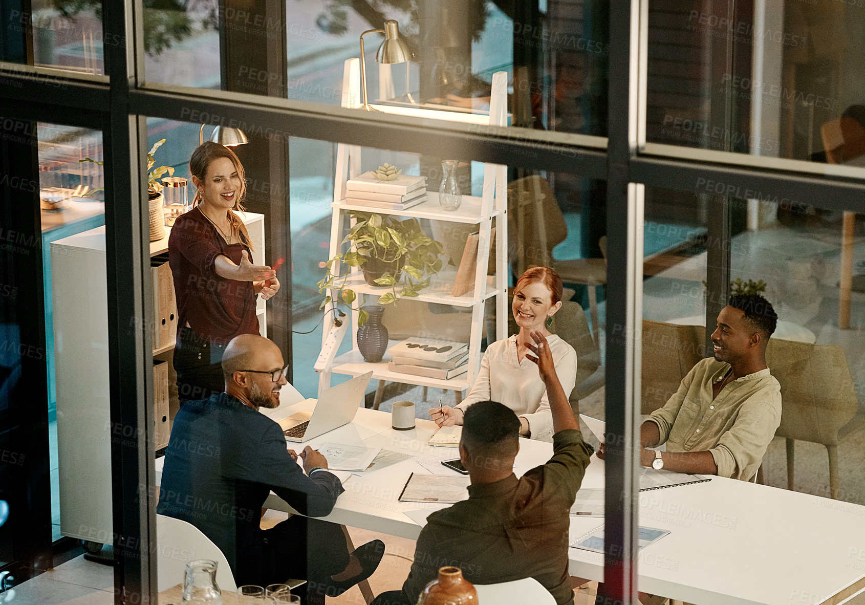 Buy stock photo Businesspeople in a marketing growth strategy discussion in a collaboration meeting using teamwork inside a modern office. Mindset development and team building by diverse, smart and creative adults