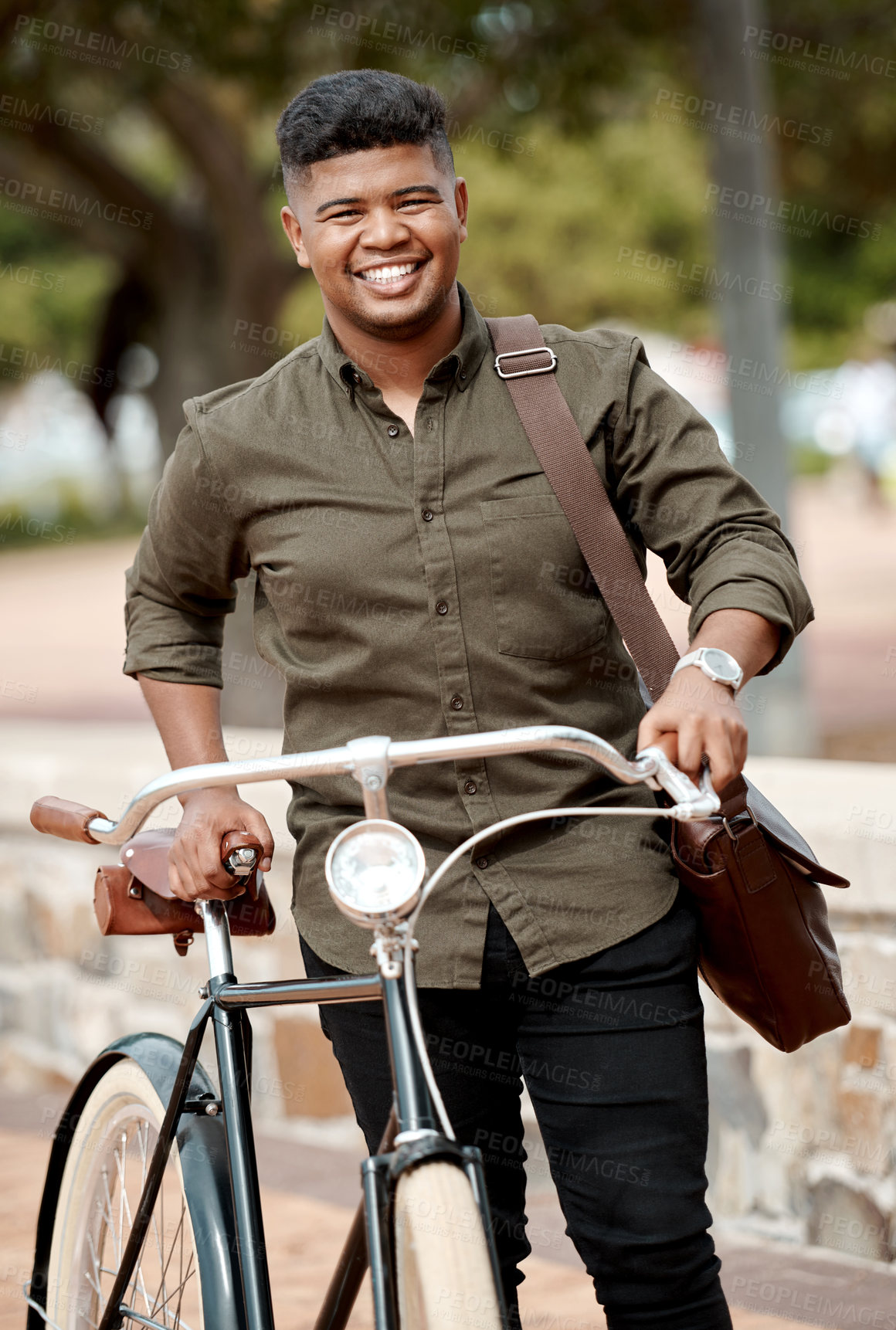 Buy stock photo Happy business man riding a bicycle, commuting and staying active while traveling in city. Portrait of a smiling, cheerful and positive guy cycling on a bike and being carbon neutral at a park