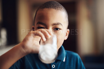 Buy stock photo Drinking, water and portrait of African boy child in home with fresh hydration, nutrition and healthy development. Thirst, wellness and kid in kitchen with clean beverage in glass on weekend morning