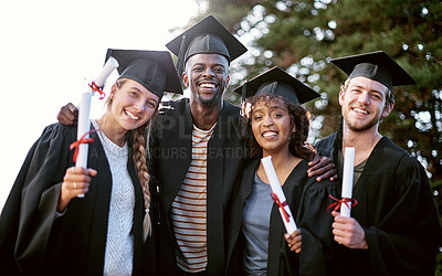 Buy stock photo Portrait of a group of students standing together on graduation day