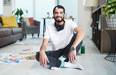 Buy stock photo Portrait of an artist sitting at home after painting