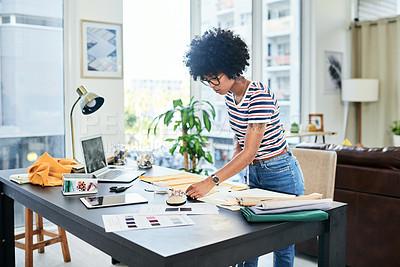 Buy stock photo Shot of a young designer working from home
