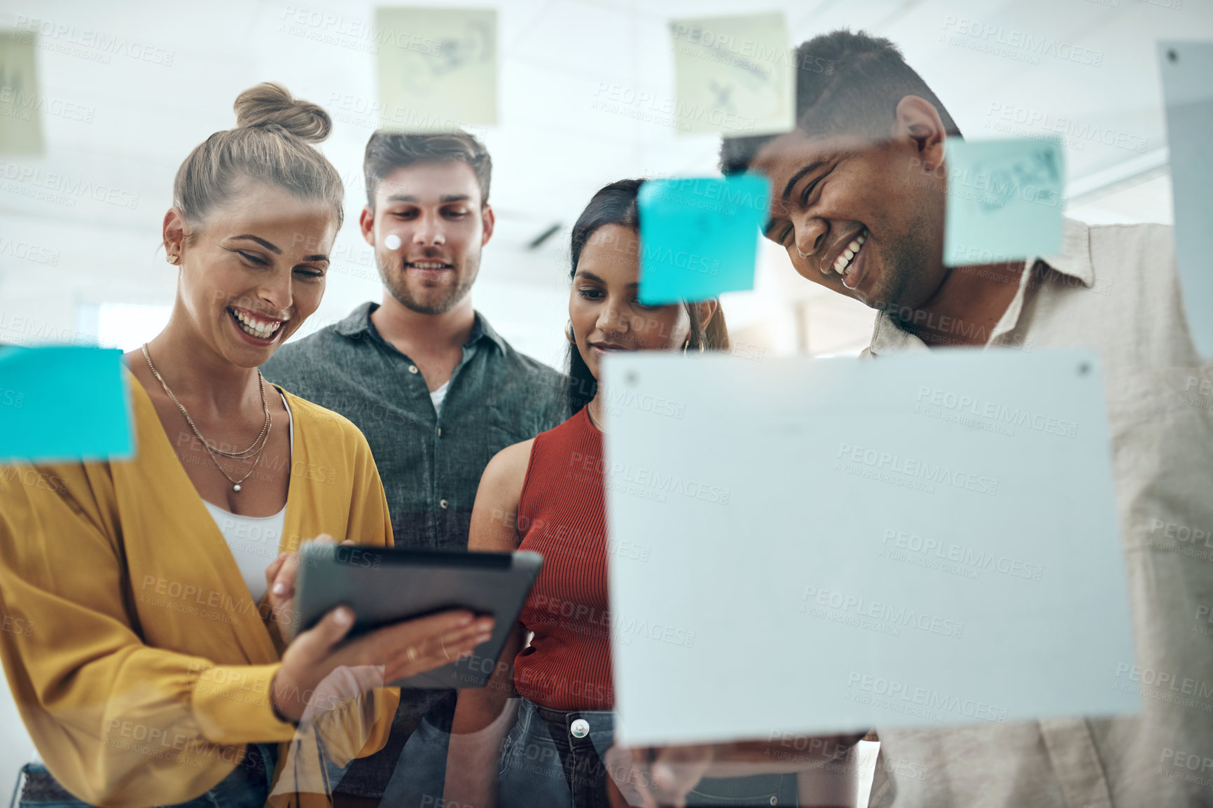 Buy stock photo Group, glass wall and teamwork in office with sticky note for idea, tablet or smile for synergy at startup, Team, board and reading with brainstorming, diversity or problem solving at creative agency