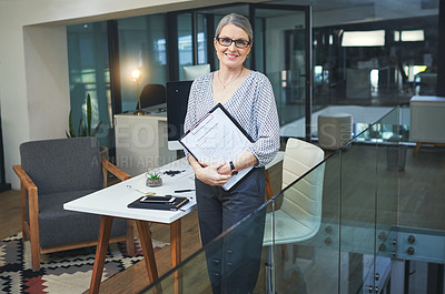 Buy stock photo Portrait of a confident mature psychologist working in a modern office