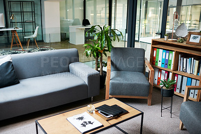 Buy stock photo Shot of a sofa in a therapist’s consulting room