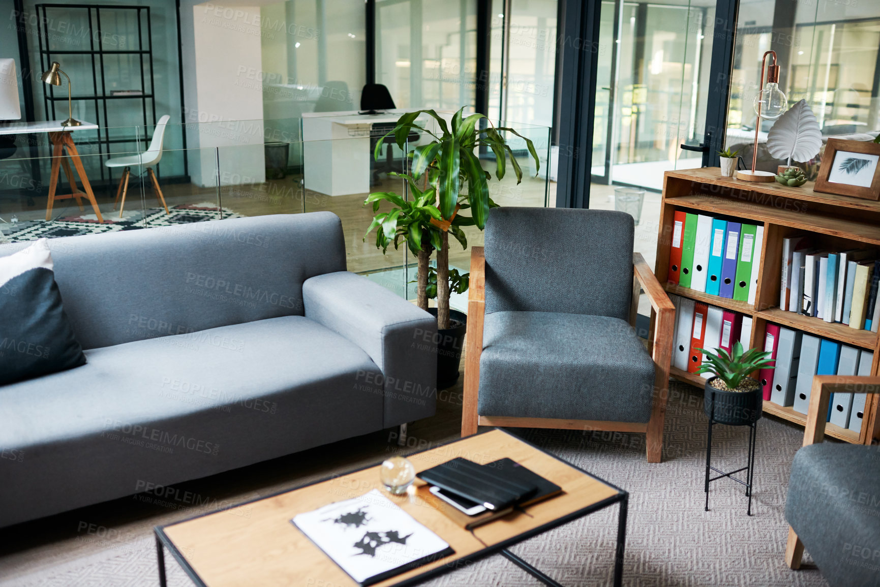 Buy stock photo Shot of a sofa in a therapist’s consulting room