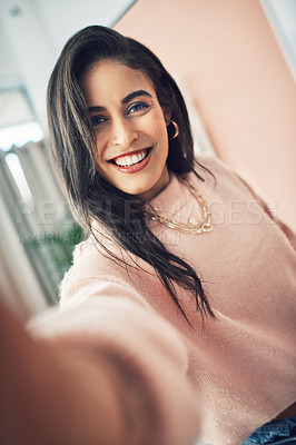 Buy stock photo Cropped shot of a beautiful young woman smiling at the camera