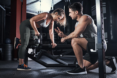 Buy stock photo People, weightlifting and dumbbell in gym as personal trainer for athlete, challenge and progress. Man, woman and training for sports practice, muscle and wellness with workout, fitness and exercise