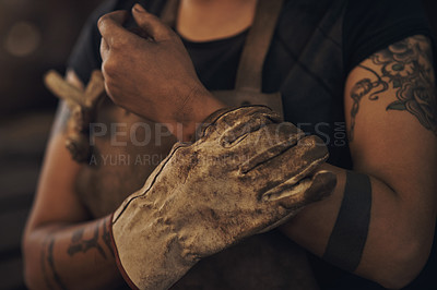 Buy stock photo Woman, arm and pain in workplace for injury, accident and emergency with muscle, joint or bone. Worker, wrist and problem or fracture in metal industry for risk, wound and health or safety compliance