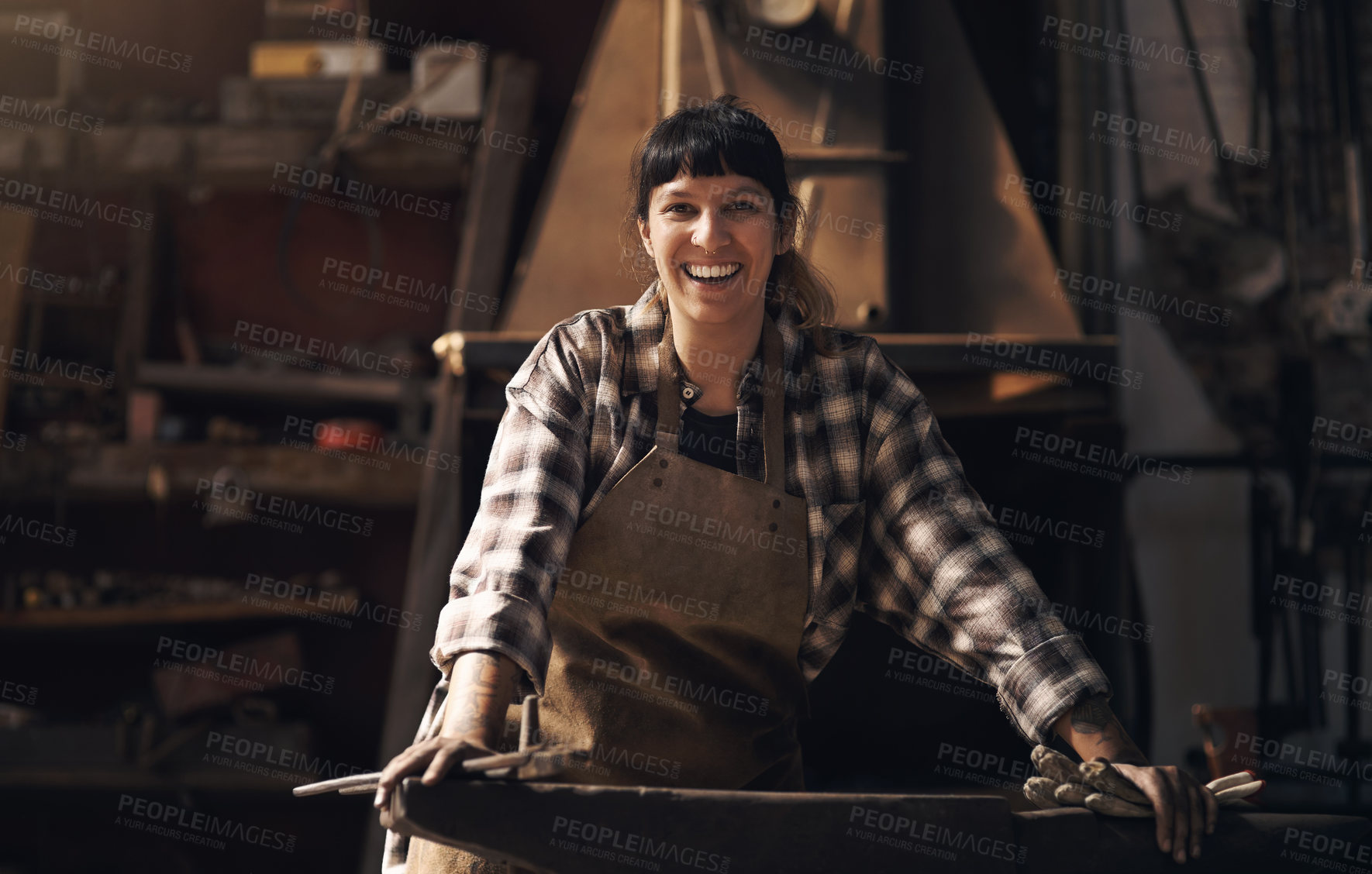 Buy stock photo Foundry, warehouse and portrait of woman with tools for industry, manufacturing and manual labor. Industrial factory, welding and female person for steel, iron and metal production for craftsmanship