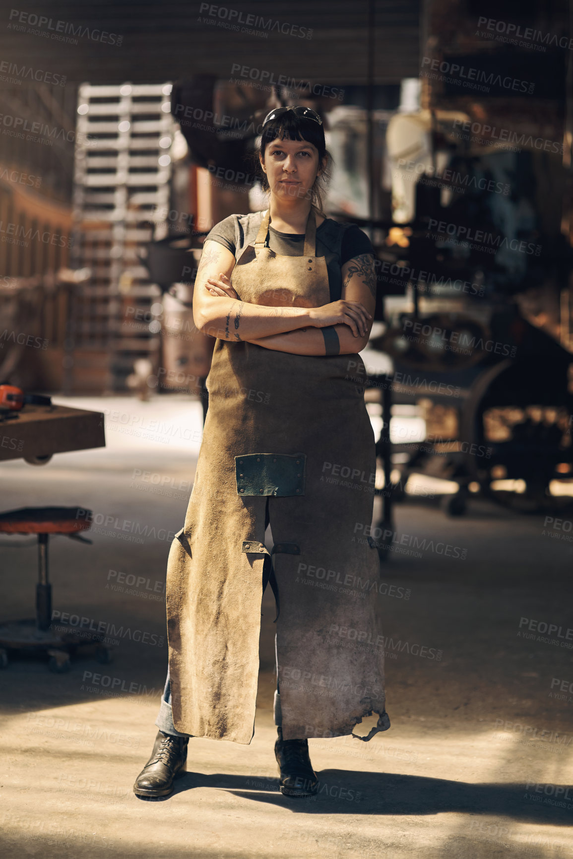 Buy stock photo Blacksmith, workshop and portrait of woman with crossed arms for industry, manufacturing and welding. Industrial factory, warehouse and female person for steel, iron and metal production in foundry