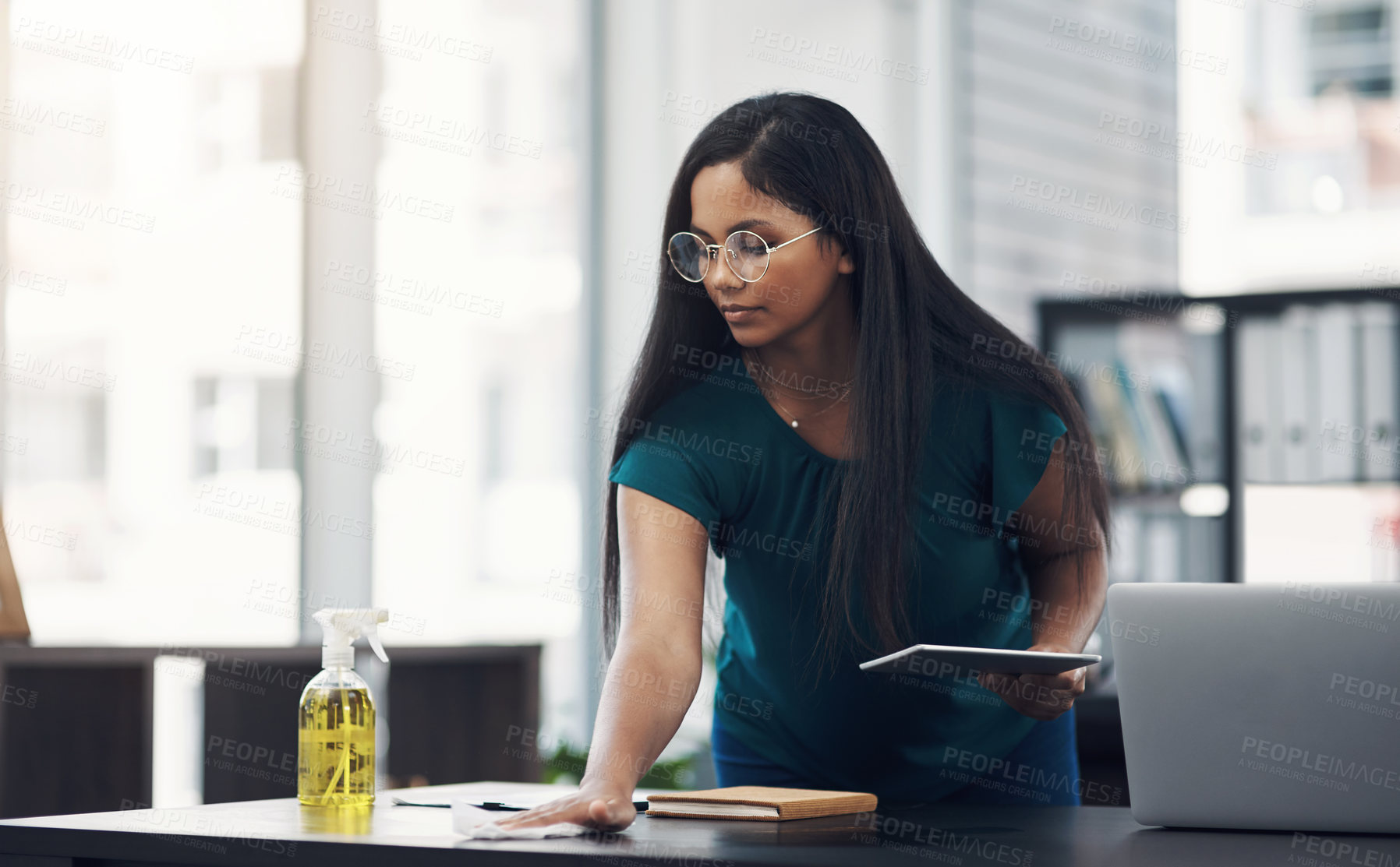 Buy stock photo Woman, office and cloth to wipe desk, employee and disinfection of germs and bacteria. Female person, professional and chemical product for sanitizing, cleaning furniture and antibacterial soap