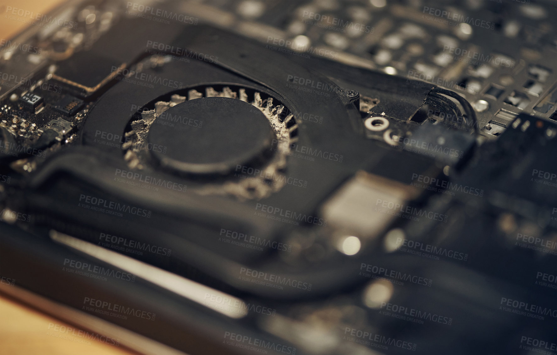 Buy stock photo Closeup, laptop and technology for fan, dust and cooling system maintenance on table in shop. Hardware, computer and repair digital electronics to service broken machine, dirty or engineering upgrade