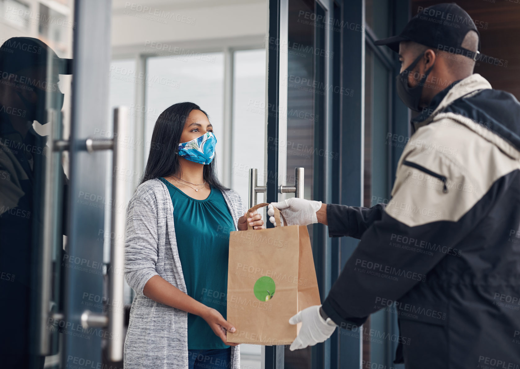 Buy stock photo Delivery man, mask and package to woman by home for online shopping, eco friendly grocery order or courier . Logistics service, supply chain or customer with organic parcel distribution by front door