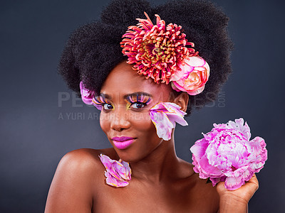 Buy stock photo Beauty, flowers and makeover with portrait of black woman in studio on dark background for natural cosmetics. Afro, face or makeup and young model with protea in hair for aesthetic wellness at spa