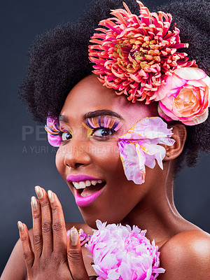 Buy stock photo Beauty, flowers and wow portrait of black woman in studio on dark background for natural cosmetics. Afro, makeup or face surprise and young model with protea in hair for aesthetic wellness at spa