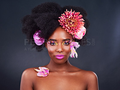 Buy stock photo Flowers, makeup and portrait of afro black woman in studio on dark background for natural cosmetics. Beauty, face or skincare and young model with protea in hair for aesthetic wellness at spa