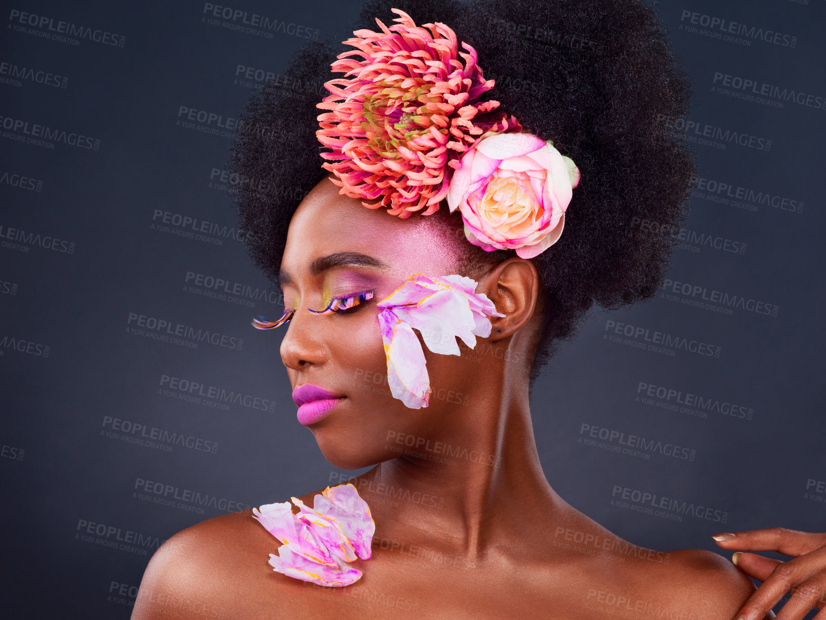 Buy stock photo Flowers, makeup and profile of happy black woman for natural, cosmetics and spring. Makeup, eco friendly and floral with face of female model in studio for aesthetic, self love and organic skincare.