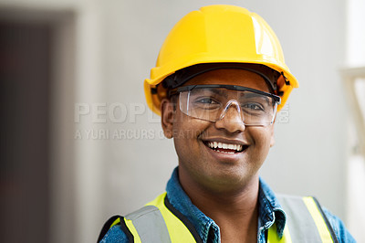 Buy stock photo Shot of a engineer wearing protective gear on a construction site