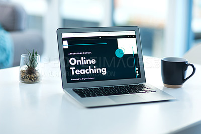 Buy stock photo Shot of a laptop displaying an online learning course on it’s screen