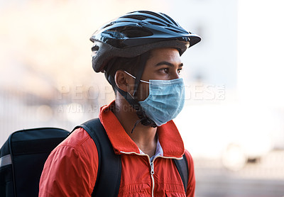 Buy stock photo Cropped shot of a delivery man wearing a mask