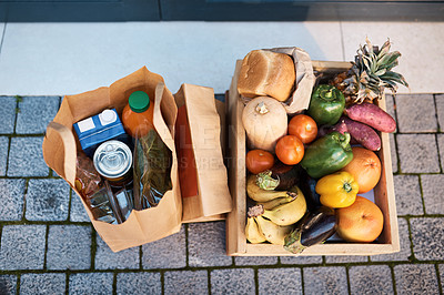 Buy stock photo Shot of groceries delivered to a customer's door