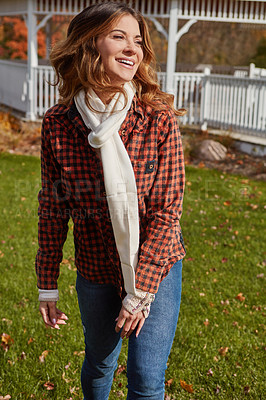 Buy stock photo Cropped shot of an attractive young woman in the park during autumn