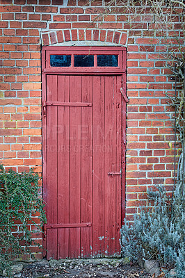 Buy stock photo An old, large, red wooden door in a face brick building, most likely a house in a residential district. The entrance way to a house or home. When opportunity knocks, you answer. A vintage residence