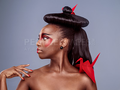 Buy stock photo Asian fashion, culture and origami with black woman in studio isolated on gray background for style. Beauty, thinking or tradition with African model in makeup for cosmetics, fusion and inspiration